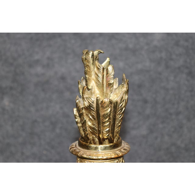 This impressive pair of French bronze chenets, or fireplace andirons, dating from the late nineteenth to early twentieth...