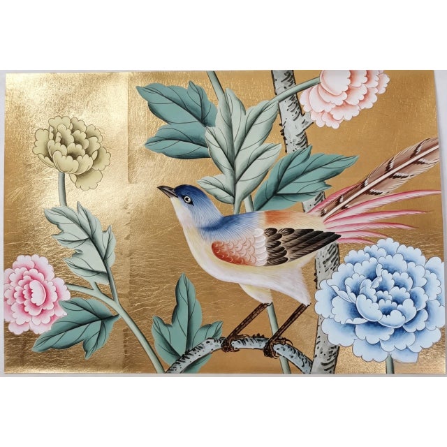 Elegant hand painted wallpaper sample featuring a refined bird and peony floral motif on a luxurious gold leaf background....
