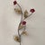 The product is a rare vintage enameled floral wall sculpture by Curtis Jere from the 1960s. It is an original piece signed...