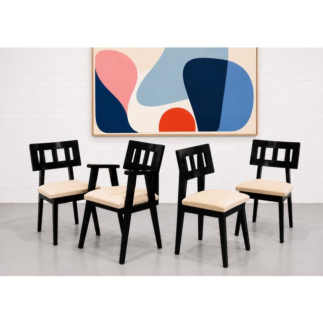 Set of Four Mid Century Modern Ebonized Dining Chairs, c. 1950's. The square spindled back supports are funky yet...