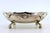 Silver Candy Box with Embossed Rim and Scrolled Feet, in Very Good conditions. Designed from 2000 This piece has an...