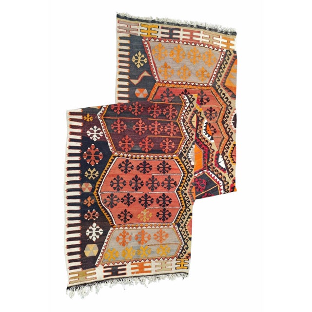 Decorative oriental kilim. Hand-woven from natural wool. Geometric medallions filled with ornaments composed into a...