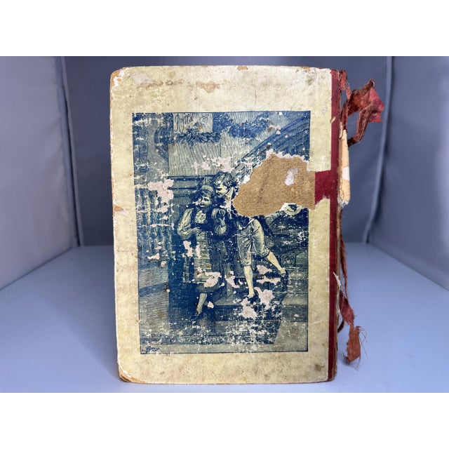 Antique Alice in Wonderland Book, "Alice's Adventures in Wonderland" by Lewis Carroll for your consideration. The book...