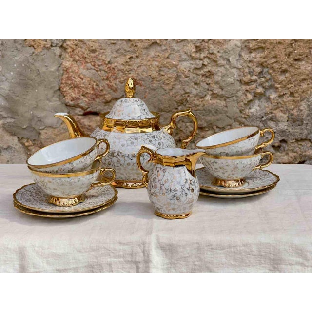 Exclusive vintage tea service for four in the finest white porcelain, produced by the renowned German manufacturer...