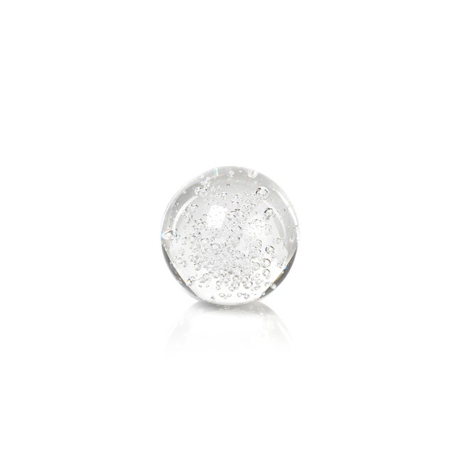 Strikingly simple, our gorgeous glass orb set reflects light with its unique internal bubbling and brilliant surface....
