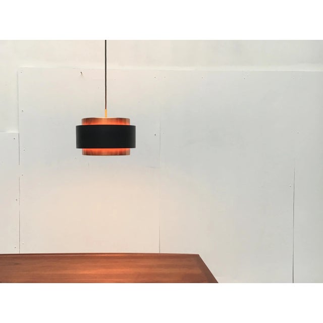 The Saturn is a classic design by the Danish manufacturer Fog & Mørup after a design by Jo Hammerborg circa 1950. Here an...