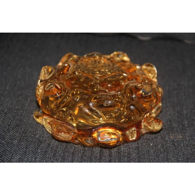 This vintage Murano glass bowl or ashtray dates to the 1940s.