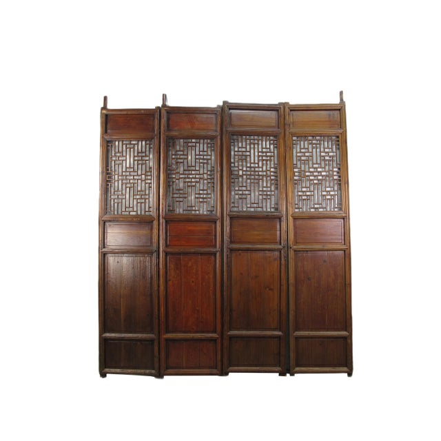 This set antique Chinese screen door panels showcase hand made intricately designed lattice patterns of Chinese symbol for...