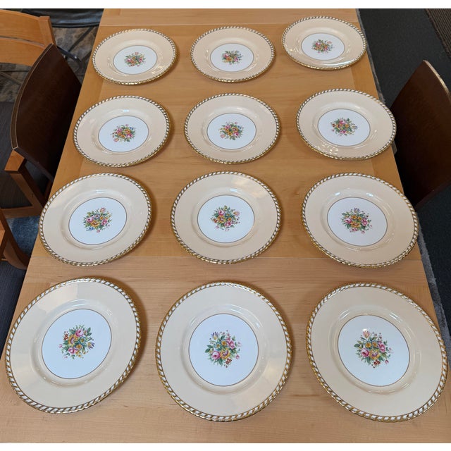 Design Plus Gallery presents a Set of Twelve English Pottery Charger Plates, Stamped by Mintons. The plate has a detailed,...