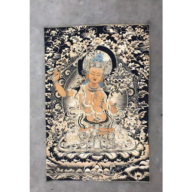 "W-60cm,H-90cm This Xizang Embroidery and Brocade Thangka Buddha Painting is a handmade spiritual home decor piece...