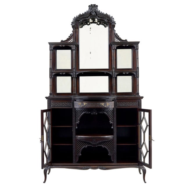 edwardian chinese chippendale carved mahogany cabinet, circa 1905. 2 part edwardian mirrored cabinet in the chippendale...