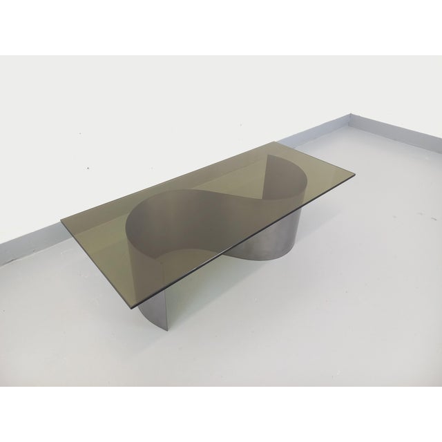 Vintage 1970s coffee table, Space Age style reminiscent of French designer François Monnet, with a striking design...