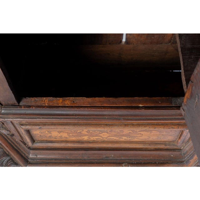 18th century Italian cupboard with great, detailed carvings. Top drawer and bottom compartment with one shelf. Hidden...
