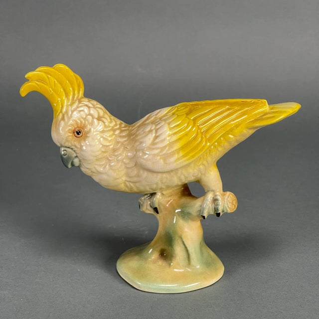 Beautifully sculpted and artfully glazed yellow cockatoo figurine from the studio of the mid-century potter Brad Keeler....