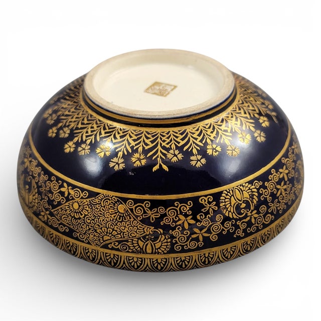 An antique signed Kinkozan Kyoto Satsuma bowl, circa 1880, demonstrating the workshop’s hallmark precision. A deep cobalt-...