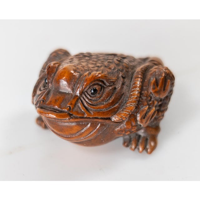 We are selling this cool mid 20th century Japanese Netsuke. This netsuke is in the form of a three legged frog and has...