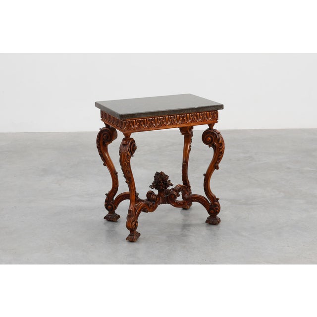 A magnificent pair of French side tables from the turn of the 20th century, crafted in the opulent Napoleon III style....