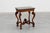 A magnificent pair of French side tables from the turn of the 20th century, crafted in the opulent Napoleon III style....