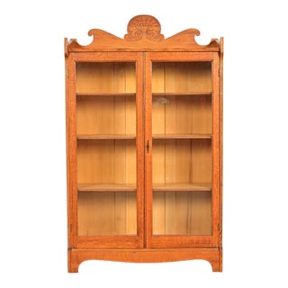 Antique Victorian Carved Oak Two-Door Bookcase Cabinet | Circa 1920s For Sale