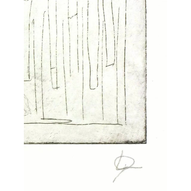 Modern German engraving of a nude male, 1990s. Signed lower right. Original artwork on paper displayed on a white mat with...