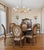 The Theodore Alexander Large Round Mahogany Dining Extension Table is a stunning piece of furniture designed for the...