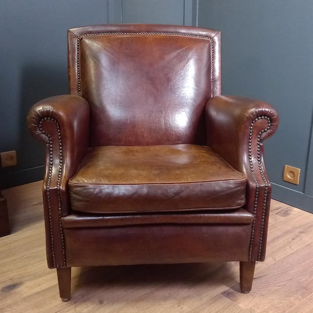 Sheepskin club armchair from Bristol – vintage Art Deco armchair, brown leather This beautiful sheepskin club armchair...