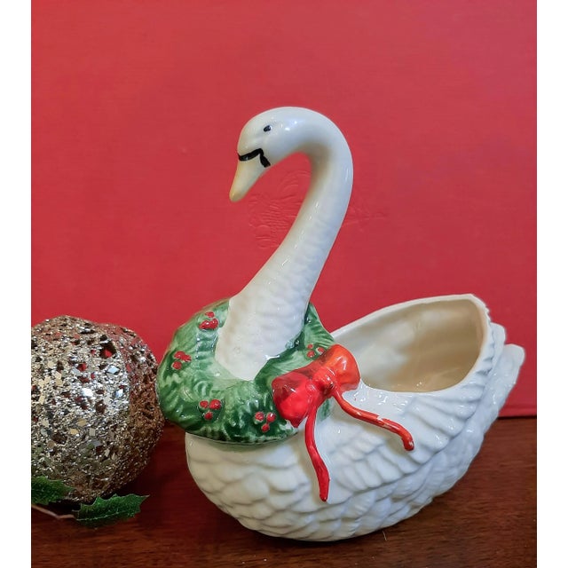 Stunning white pottery swan planter vase that perfectly encapsulates the spirit of Christmas! Adorned with a beautiful...