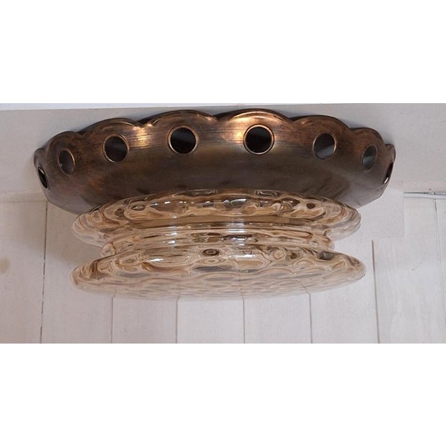 Vintage Ceiling Lamp with Patinated Brass Trim and Amber-Tinted Glass Shade, 1970s, in Very Good conditions. Designed 1970...