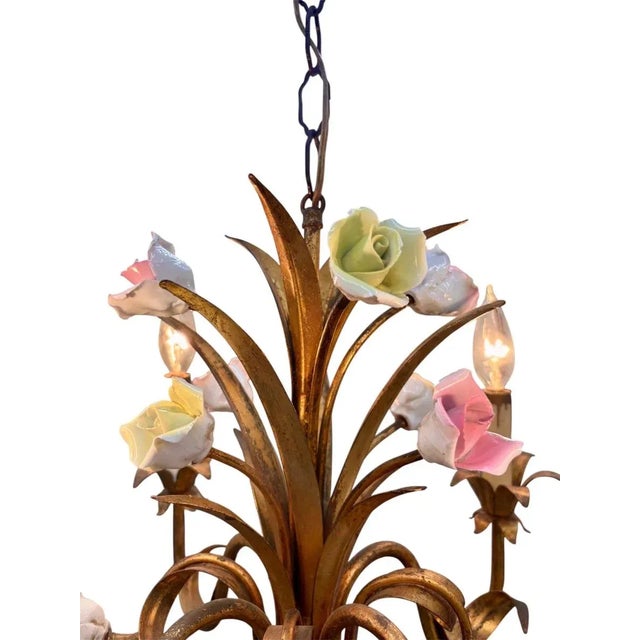 A 1960's Italian gilt tole , hand painted enamel roses, four arm chandelier/pendant with 10+ foot of chain and wire ending...