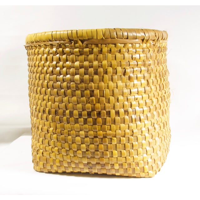 Round top square bottom honey tone weaved basket. Makes a great planter, just insert a waterproof drip tray.