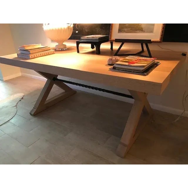 Custom made 72" long bleached oak and steel dining table. 3" thick edge, legs recessed back from the edges approx 3". Copy...