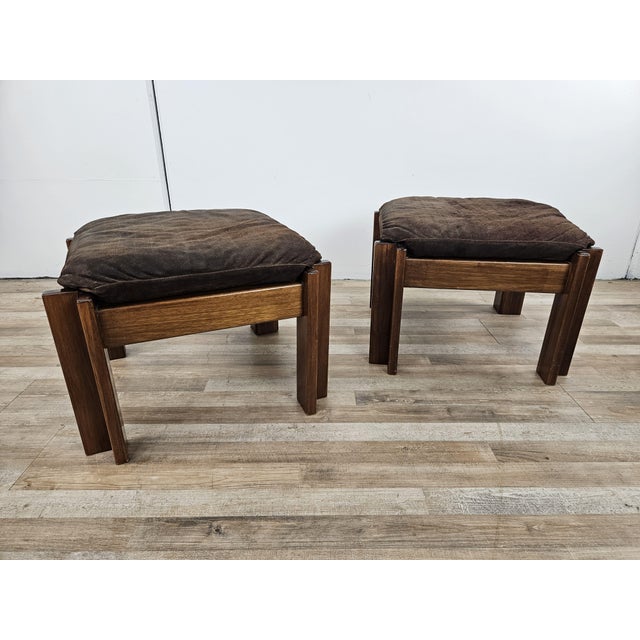 Pair of elegant and post-modern poufs in walnut wood with upholstered and padded seat, Italian production circa 1970s. The...