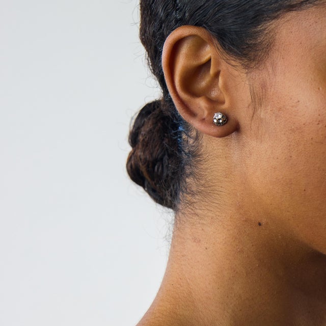 These elegant Art Deco style diamond stud earrings are a beautifully refined contemporary design inspired by the clean...