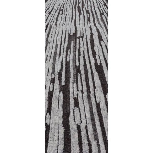 Measures: 3'0 x 13'5 Modern Runner with Vertical Striped Design in Charcoal and Soft Grey 3 x 13'5. Keivan Woven Arts /...