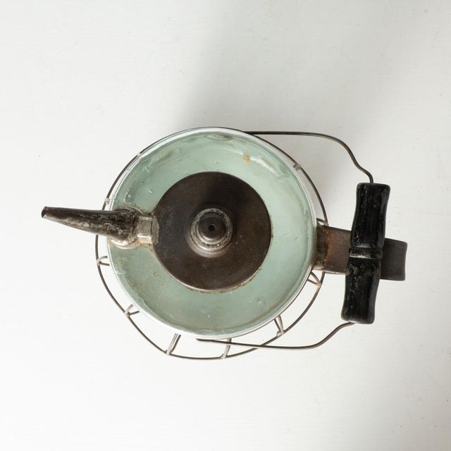 19th Century Glass Kerosene Bottle with Wire Cage. Would look great in a man cave or shop.