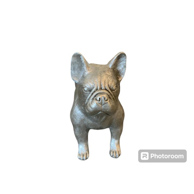 Add a touch of whimsy and modern charm to your decor with this eye-catching large metallic silver French bulldog. Crafted...