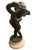 This is a 19th-century French patinated bronze musical cherub or putto sculpture after Claude Michel Clodion, featuring...