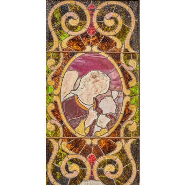 A magnificent antique architectural salvaged church stained glass window panel with a beautiful mix of bright, lustrous...