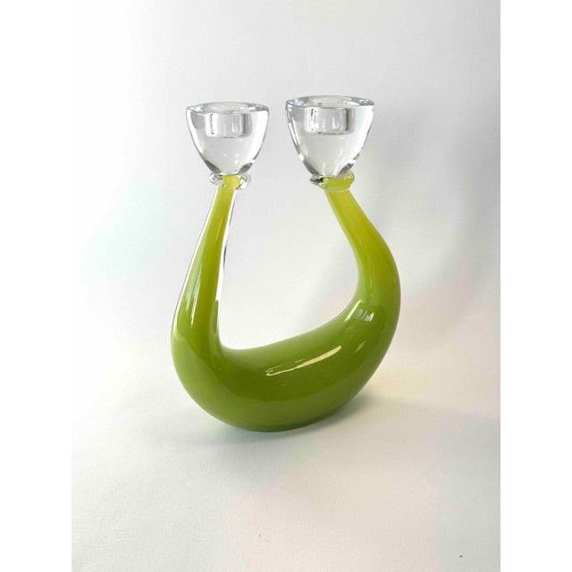 A beautiful timeless green glass candle holder with a shape dating back to the 1990s. This highly unusual, elegant beauty...