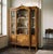 A fine antique French Louis XV style bibliotheque (bookcase), or display cabinet made by master ébéniste Schmit & Cie....