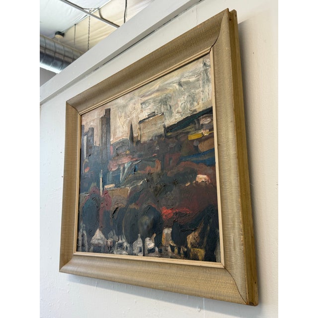 This is a midcentury moody urban landscape oil on canvas. The colors are primarily an earthy, nocturnal palette, and the...
