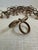 1960s Vintage Mid Century Regency Brass Tassel Bow Napkin Rings Set of 13 For Sale - Image 5 of 10