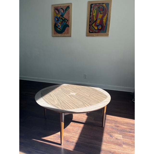 * Solid wood with rich walnut-tone veneer * Sculptural 3-leg design (classic 1950s–60s style) * Elegant inlaid star detail...