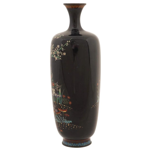 A finely executed Japanese cloisonné enamel vase dating to the Meiji period, signed on the underside and worked throughout...