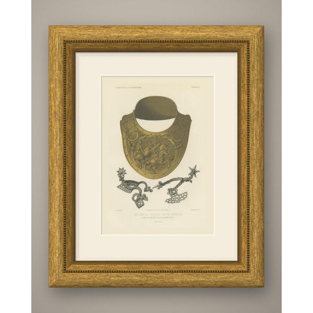 This is an original antique chromolithograph, printed in gold and olive bronze with steel gray, showing a gorget above a...