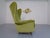 Wingback armchair upholstered in green mohair, in the style of Gio Ponti from the 1950s. Slightly flared teak legs. Loose...
