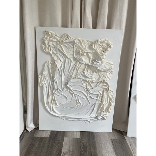 “Washed in Stillness” is a faith-rooted sculptural textile artwork embodying peace, surrender, and sacred presence....