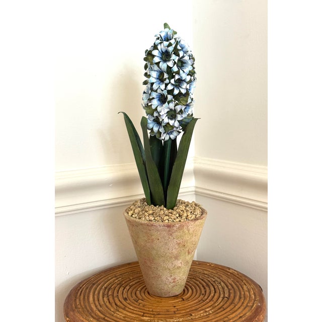 Vintage sculptural tole formed and painted as a blue hyacinth potted in a terracotta pot. Finished with stones. Handmade...