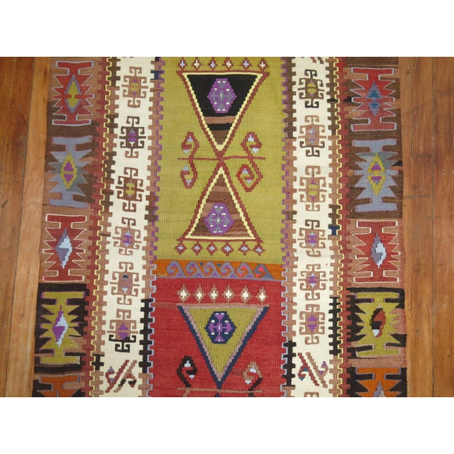 Fascinating Turkish geometric Kilim flatweave runner.