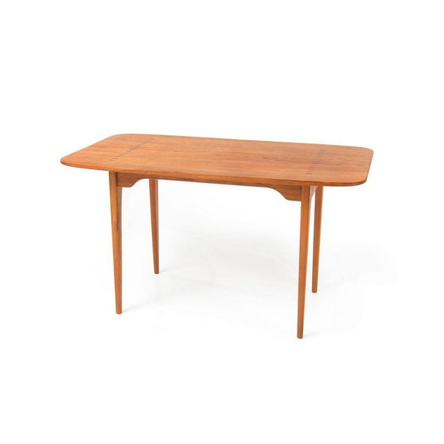 This elegant, one-of-a-kind table was crafted in Sweden in the mid-1950s. Its high-quality finish is the work of an...